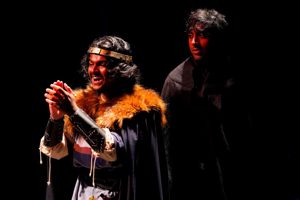 two actors in medieval costumes two actors in medieval costumes