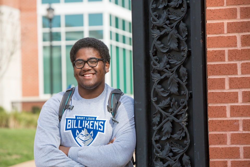 Student outside Spring Hall