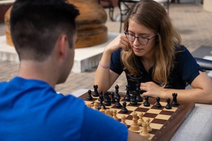 Members of the chess team battling it out in a game of chess