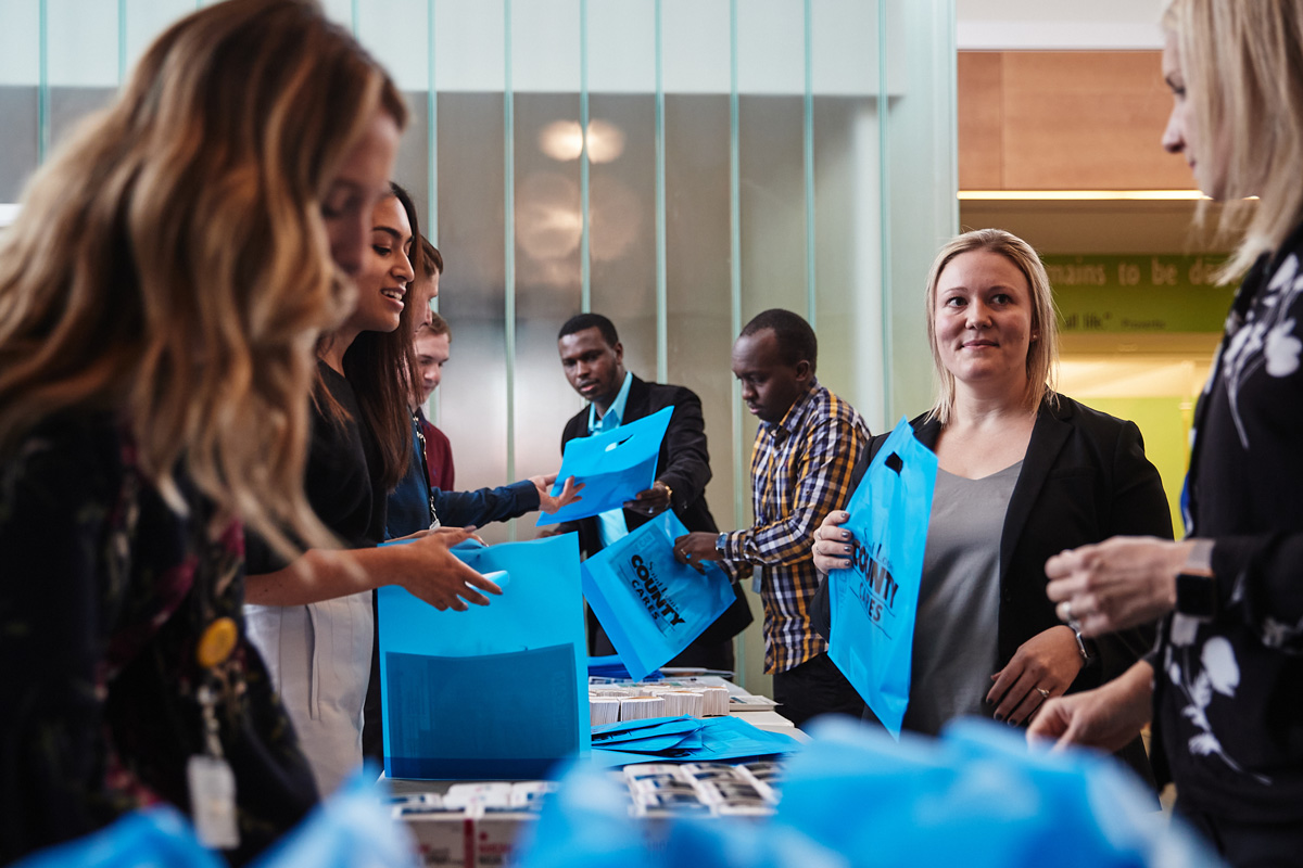 Students packing public health kits at the county health department.