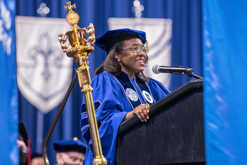 Tiffany (Brown) Anderson speaks during a SLU Commencement ceremony